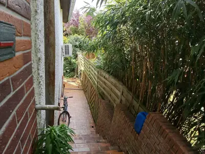 Einfamilienhaus Langenselbold - Vorderansicht mit gepflegtem Vorgarten
